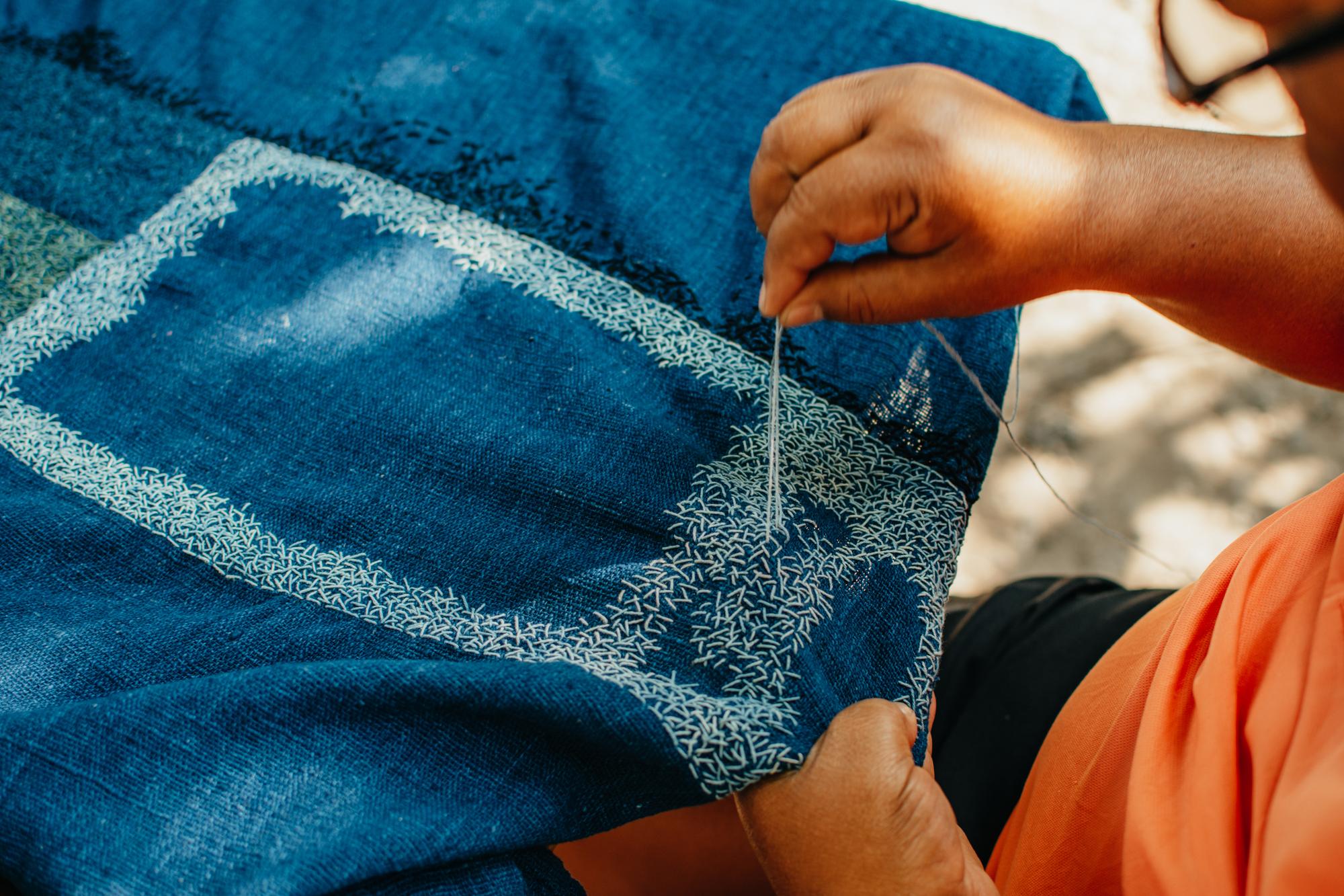 Close-up of artisan embroidery on linen